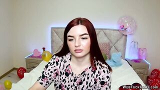 Big tits redhead strips to bra