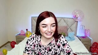 Big tits redhead strips to bra