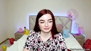 Big tits redhead strips to bra